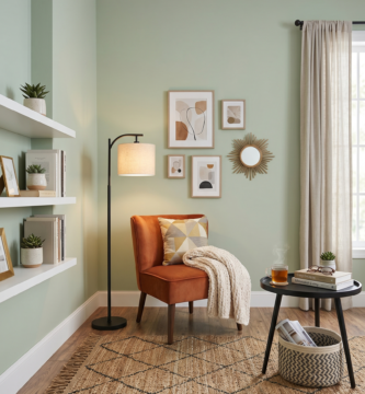 Modern luxury reading nook with orange velvet chair and minimalist decor for small apartments